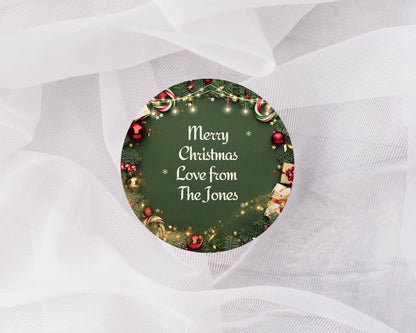 Round Christmas ornament with decorative text on a white fabric background