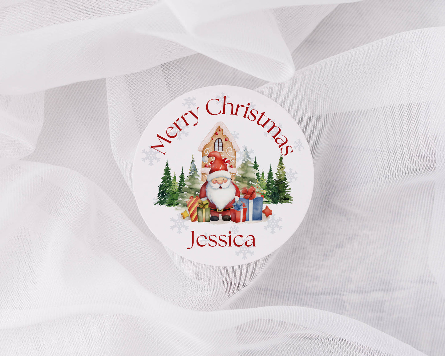 Round Christmas sticker with Santa Claus, trees, and presents on a white background